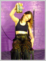  Felicity coats her black combats and sports bra in thick golden syrup featuring Felicity, the Serving Wench 